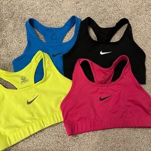 Nike Sports Bras in Black, Blue, Pink, and Yellow